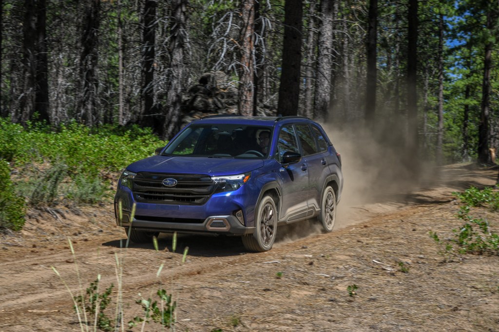 The front quarter end of the 2026 Subaru Forester Sport Hybrid off-road