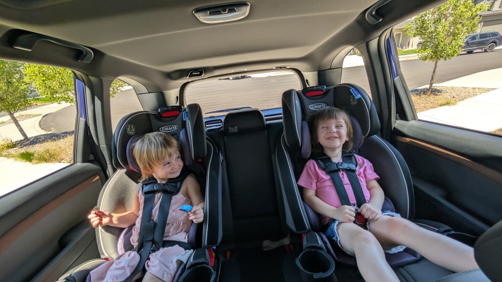 My two toddlers sitting in the back of the 2026 Subaru Forester Sport Hybrid